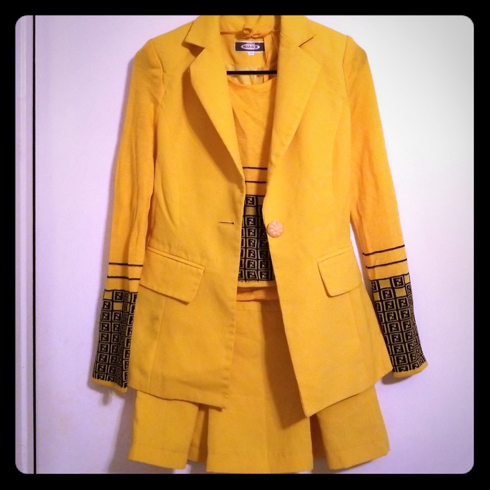 3 piece Fendi style suits.